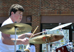Casey Cullen, a senior, performs with the Chittenango High School Dixieland Band during the Oz-Stravaganza parade on Saturday, June 6, 2015. Photo by Brian McDowell