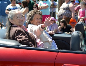 As a teenager, Myrna Clifton was scheduled to appear in MGM’s Wizard of Oz, as were her parents. The girl’s emergency appendectomy sidelined the family trip to Culver City, California; by the time they were ready to travel, the film was too far into production for them to be cast. Several years later, however (and still in her native Texas), Myrna caught the appreciative eye–and heart–of movie “Munchkin soldier,” Clarence Swensen. Their subsequent love affair resulted in a 63-year marriage, three daughters, grandchildren, and greatgrandchildren. Since Clarence’s passing in 2009, Myrna (right in photo during Saturday's parade) has continued to appear at nationwide Oz festivals, where the Swensens were much-admired, much-loved regulars for two decades. [Information from Oz-Stravaganza] Photo by Brian McDowell