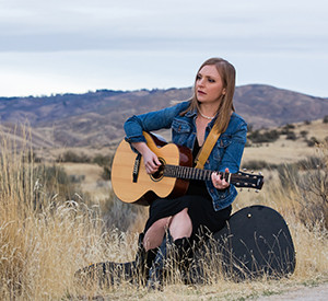 Portrait of Eilen Jewell at Military Reserve Park in Boise, Idaho on October 22, 2014. Photo by Otto Kitsinger