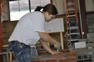 Rebecca Shoemaker, of Chenango Forks, competes in the masonry event of the Region II BOCES Skills USA competition held at Morrisville State College. Shoemaker is in the masonry program at Broome-Tioga BOCES.