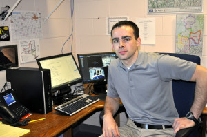 Morrisville State College student Dale Durant works in the 911 call center at the Madison County Sheriff’s Department where he is completing an internship as part of the criminal justice bachelor degree program.