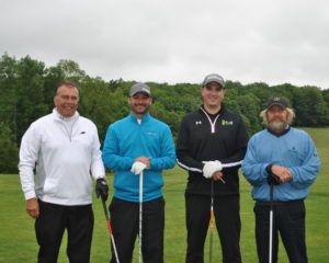 Pictured is the winning team from Day, Scarfile & Read with a score of 59. From left: Greg Bushinger, Brett Bushinger, Andrew Briggs and Kenny Miller.