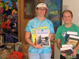 Tish Solomon and her daughter Sarah sort books for children and teens.