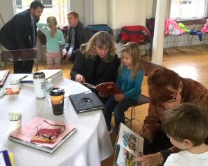 Coalition members read a favorite book with pre-kindergarten students from Madison Central.
