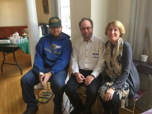 Madison County Reads Ahead tutor Gary Johnson, center, learner Brandon Fowler, and coordinator Carla Zimmerman share success.