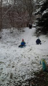 “Nature’s Nursery” students enjoy sledding after an early snowfall. Winter sessions begin on Jan. 6 at Rogers Environmental Education Center in Sherburne. Photo courtesy Friends of Rogers