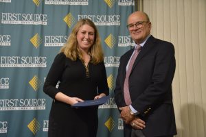 Pictured is Ember Traino, Coordinator of International Academic Programming at Herkimer College, and Anthony Nicotera, Co-Chair of The Genesis Group Education Committee.