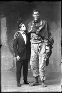 Martín Chambi (Quechua, 1891–1973), El Gigante de Paruro y Victor Mendivil, Cusco, 1925, modern black-and-white reprint, 2005, 20 x 16 in. (50.8 x 40.64 cm), courtesy of the Martín Chambi Family Archives, Cusco, Peru.